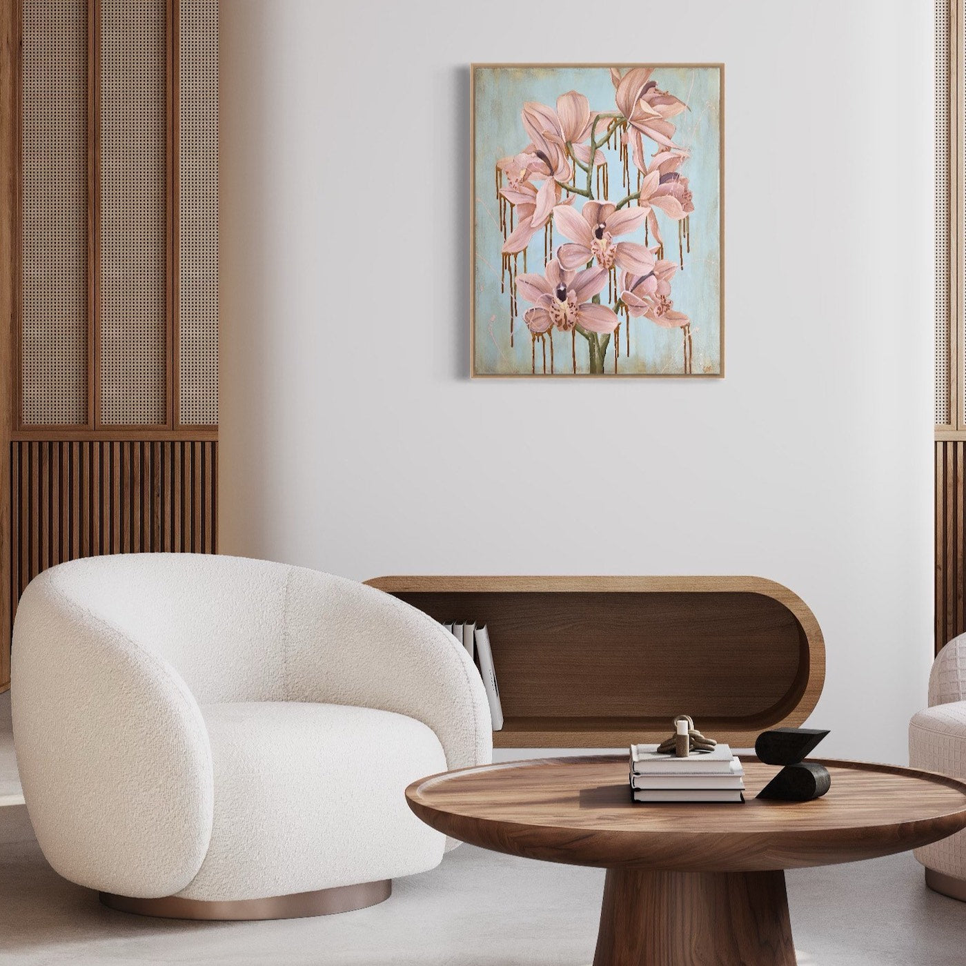 Tropical flowers in a pale shade of pink against a pastel blue background. In situ on a white wall.