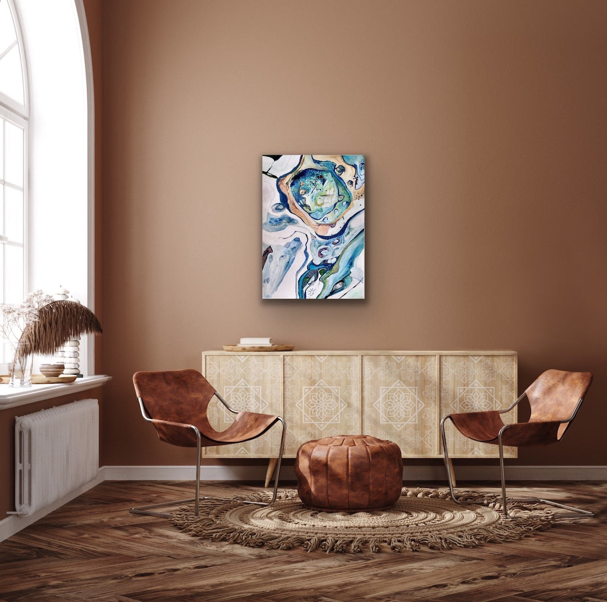 Abstract rockpool in shades of blue, green, turquoise, citrus, pink and white. Shown on a light brown wall.