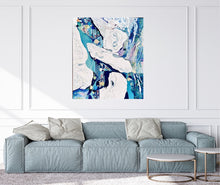 Load image into Gallery viewer, Abstract oil painting in white and blue with small multi-colours depicting stained glass. Shown on a white wall above a sage sofa.
