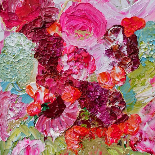pink, red and pale green blooms in a tall pale green vase. Detail view 2