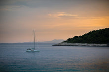 Load image into Gallery viewer, Enjoying the sunset in style in the Croatian 
islands. Hvar, Croatia

