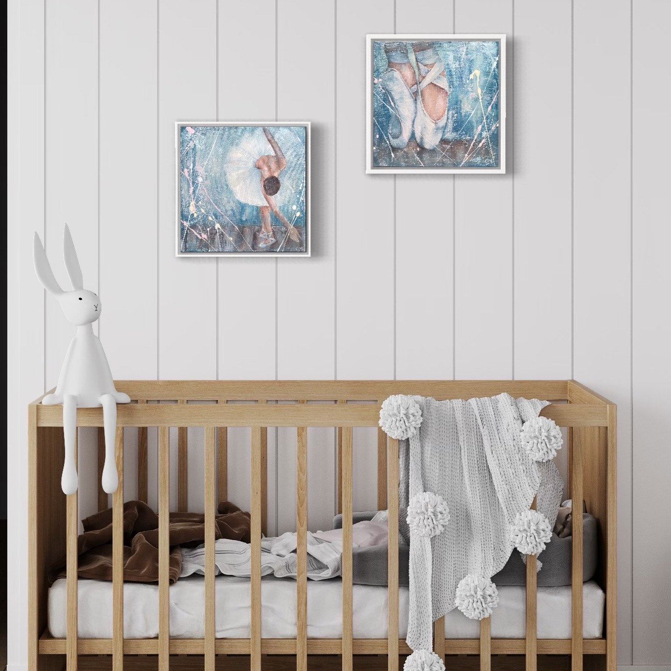 Ballerina in a white tutu bowing to the audience against a pastel blue background. In situ on a white panelled wall next to a matching painting 'en pointe'.