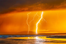 Load image into Gallery viewer, Seven Mile Beach on the NSW South Coast, with a golden sky and bolts of lightening.
