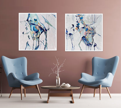 Abstract painting of a cluster of stones in a tidal pool with a background of mostly white with blues and multi coloured detail.  Shown on a wall next to a matching artwork.