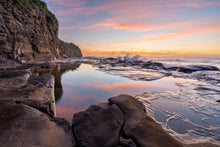 Load image into Gallery viewer, A beautiful sunrise sky reflects in the rock pools of Walkers Beach. Gerringong, Australia
