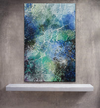 Load image into Gallery viewer, Vertical view of an original painting showing the play of light through water ripples in the ocean. Shown in situ on a beige wall.
