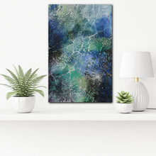 Load image into Gallery viewer, Vertical view of an original oil painting showing the play of light through water ripples in the ocean. Shown in situ on a white wall above a white shelf.

