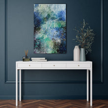 Load image into Gallery viewer, Vertical view of an original oil painting showing the play of light through water ripples in the ocean. Shown in situ on a hall table.
