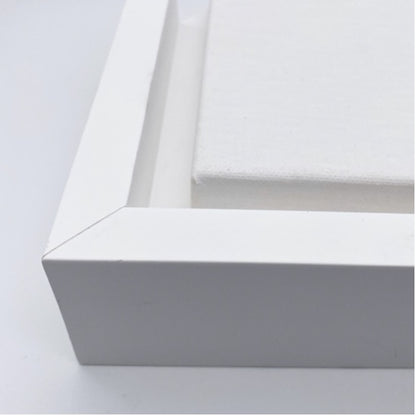 White timber floating frame.