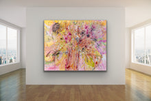 Load image into Gallery viewer, Masses of wildflowers in a painting in shades of pink, yellow, apricot and gold. Shown ion situ on a pale grey wall.
