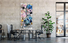 Load image into Gallery viewer, Multi-coloured abstract blooms on a cream background. In situ on an office wall.

