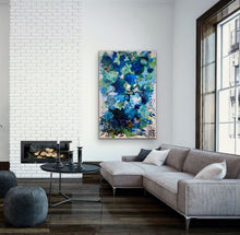 Load image into Gallery viewer, Blooms in all shades of blue, aqua, turquoise and olive. In situ on a living room wall.

