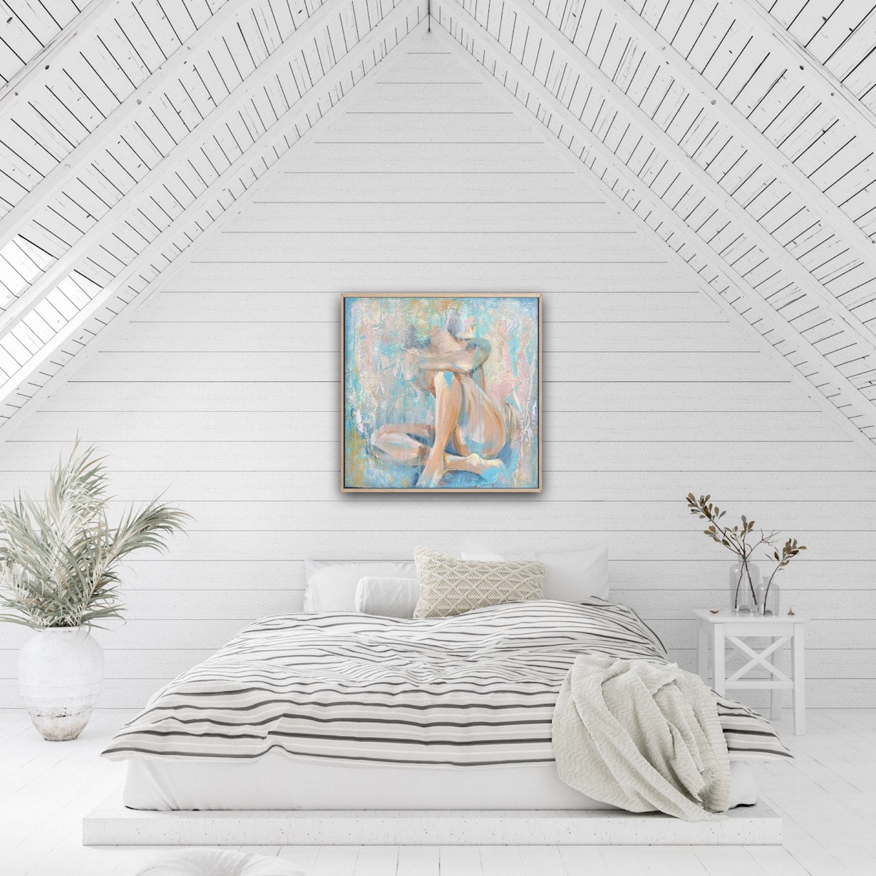 Nude figurative painting of a female against a pastel-hued background. Shown here on a white panelled bedroom wall.