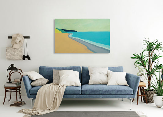 Coastal scene in a paired back, artistic style. In situ on a living room wall above a blue sofa.