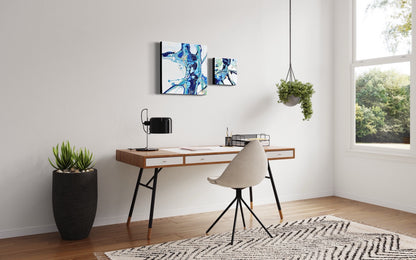 Contemporary abstract painting depicting a rock pool in shades of blue, aqua, turquoise, rose, mauve, pink ochre and white. Shown on a white wall next to another similar painting.