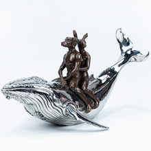 Load image into Gallery viewer, Bronze and stainless steel Sculpture of a dog man and rabbit woman riding on a whale.
